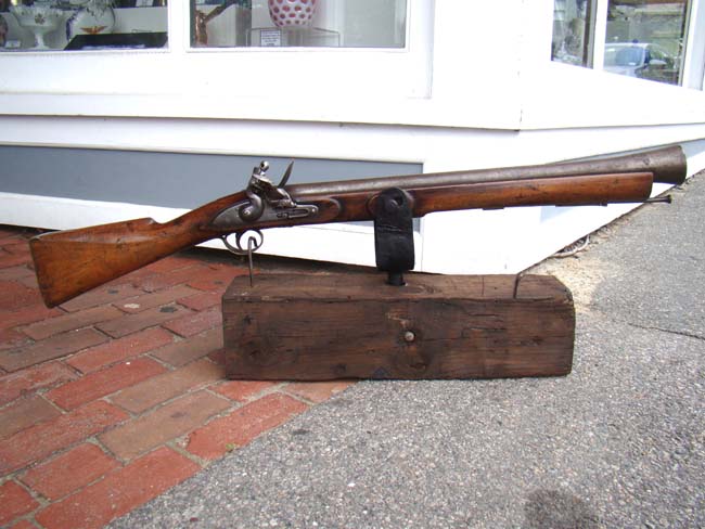 A late 18th or early 19th century steel barreled flintlock blunderbuss with swivel mount